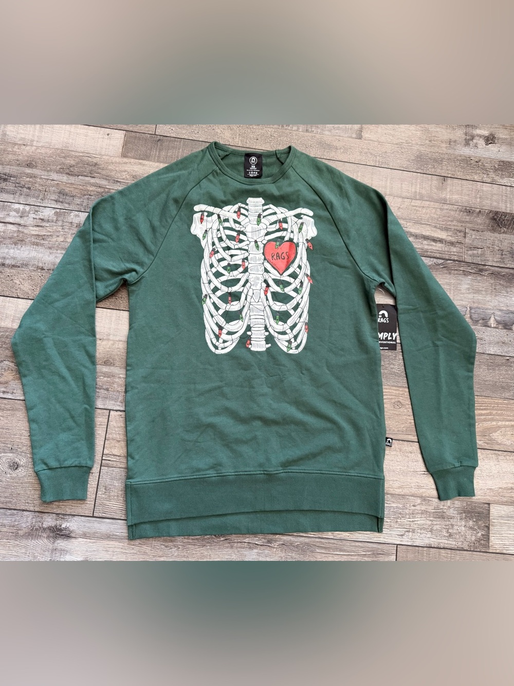💚 NWT Rags “Skelly” Forest Green Crewneck Sweatshirt with Rib Cage Graphic.
